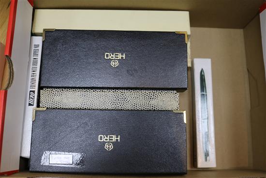 A collection of fountain pens and writing equipment